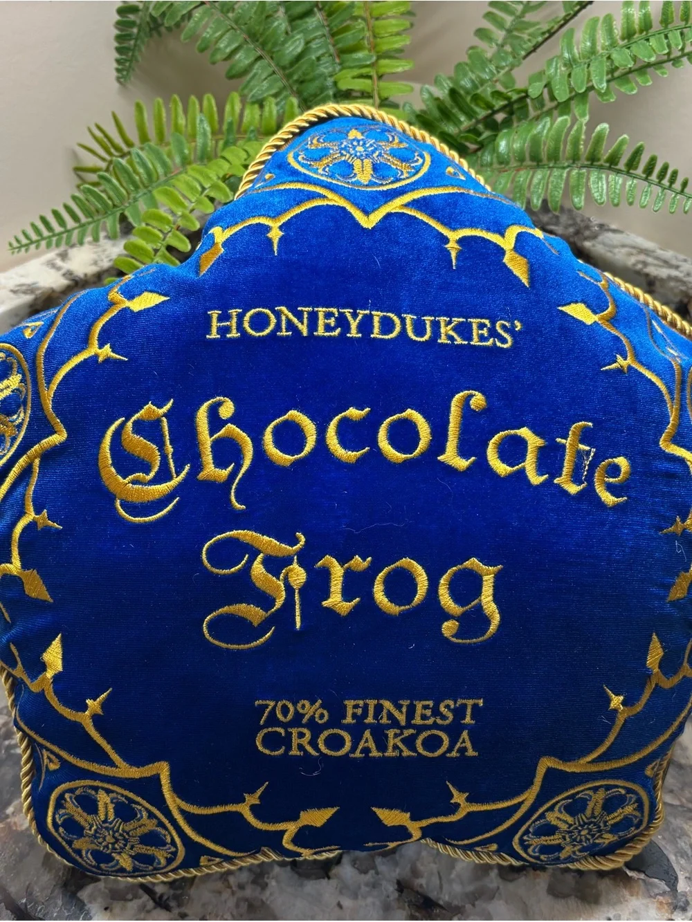 Honeydukes® Chocolate Frog Accent Pillow - with zipper frog inside